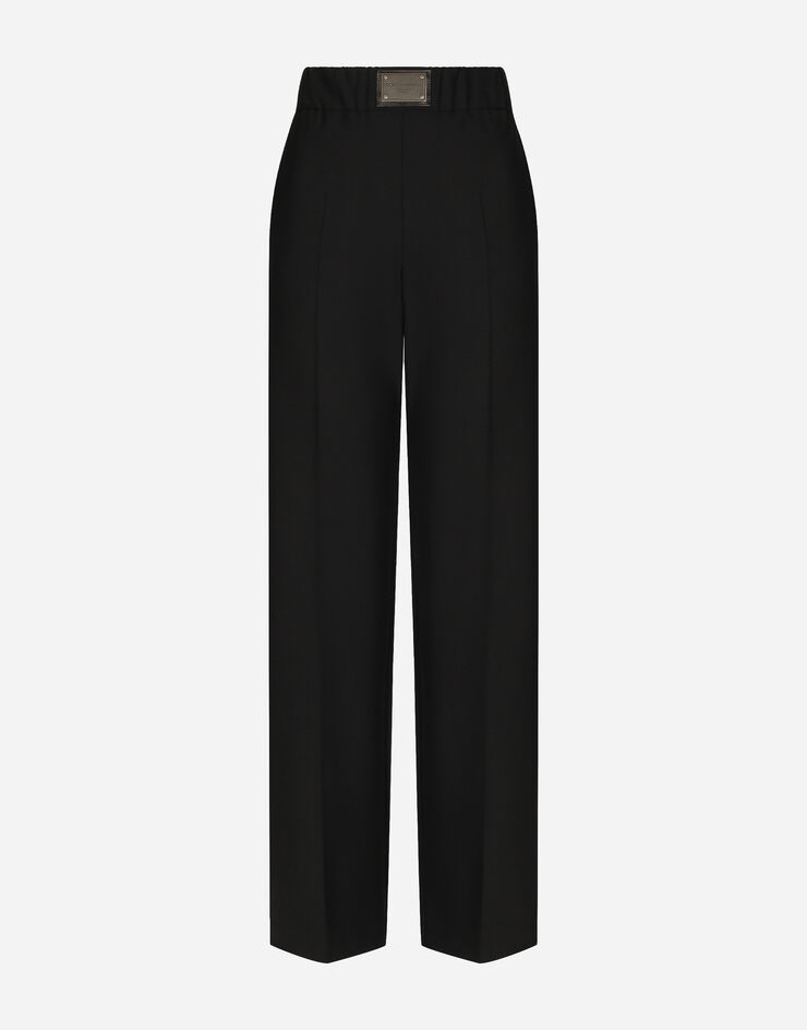 Dolce&Gabbana Flared wool pants with logo tag Black FTCZJTGDBWS
