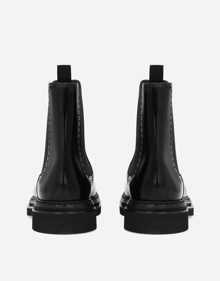 Dolce & Gabbana حذاء بوت برقبة للكاحل من جلد عجل مصقول أسود A60592A1203