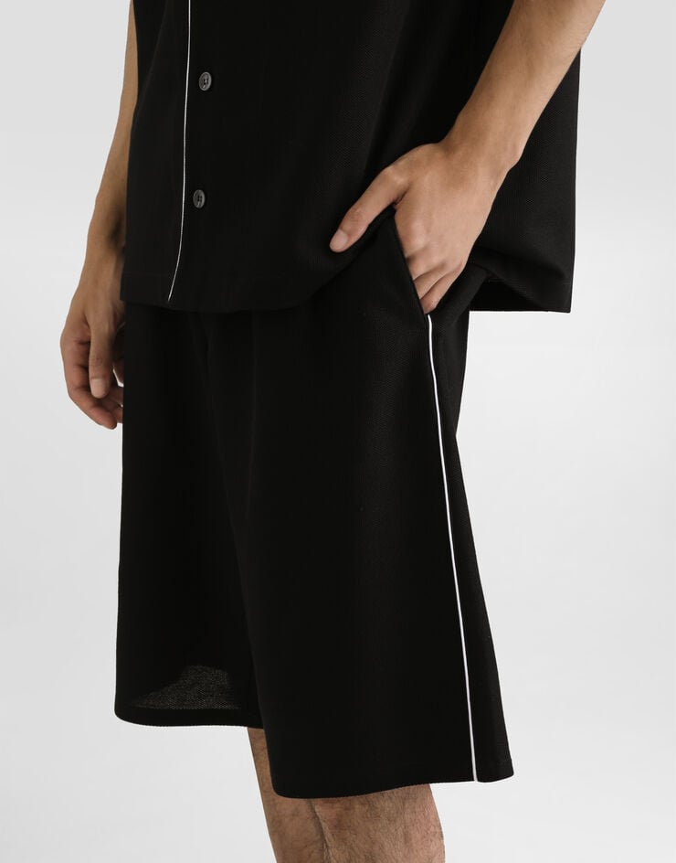 Dolce & Gabbana Hose aus Baumwollpiqué Schwarz GV5MAZHU7UT