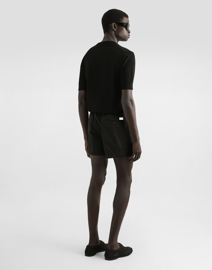 Dolce & Gabbana Pull ras de cou en coton avec plaquette Noir GXX03TJBCF5