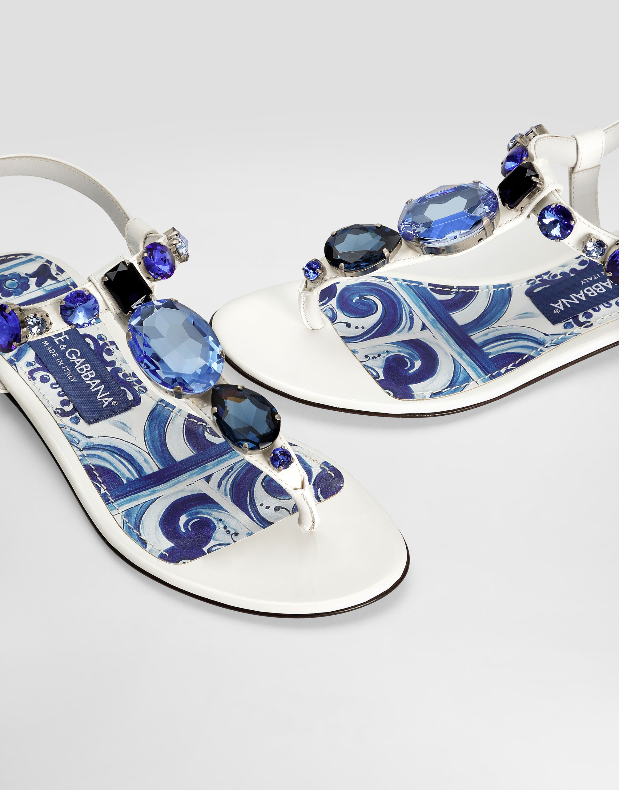 Patent leather thong sandals with embroidery in White for