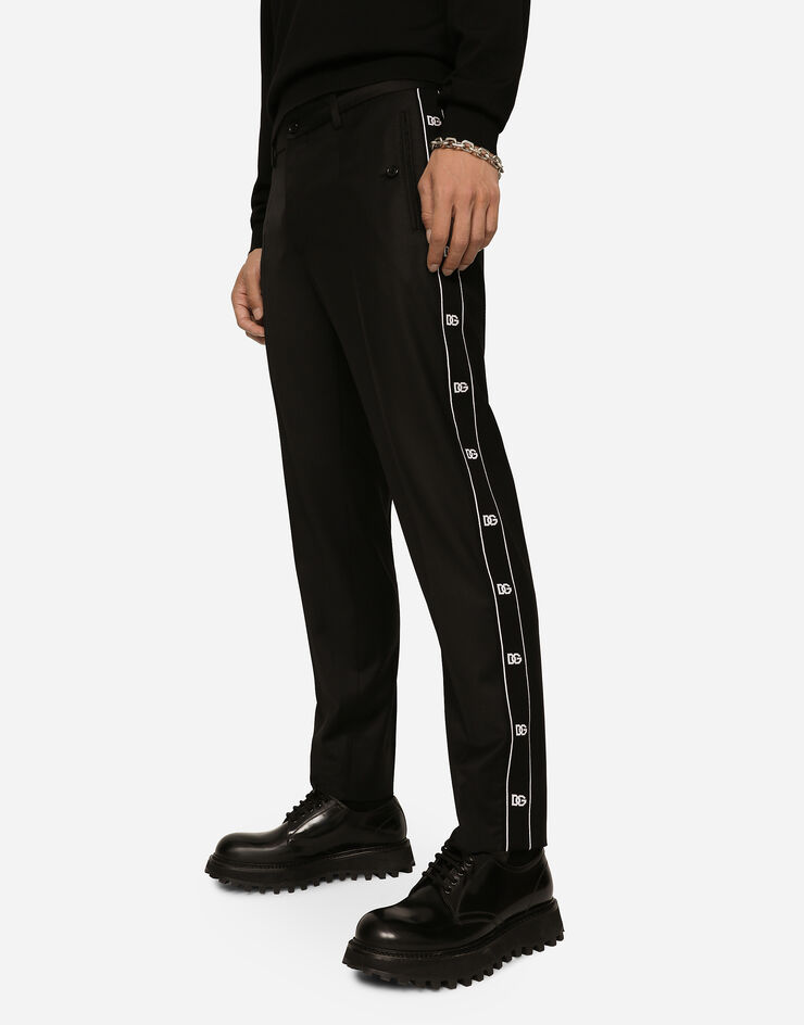Dolce & Gabbana Stretch wool pants with side bands Black GVRHETFUBFA