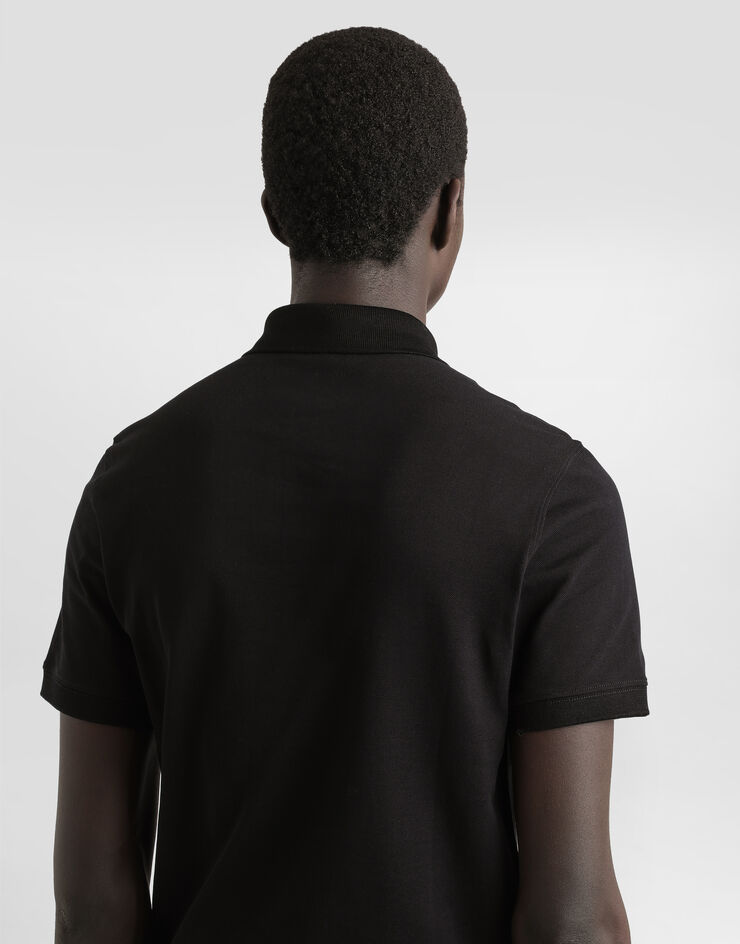 Dolce & Gabbana Poloshirt aus Baumwolle mit Stickerei Schwarz G8SN8ZG7O2I