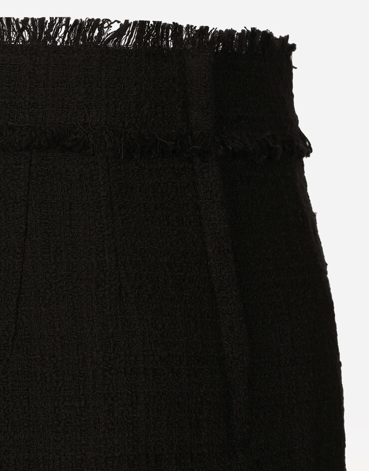 Dolce & Gabbana Falda midi de tweed con logotipo DG Negro F4CTCTFMTAC