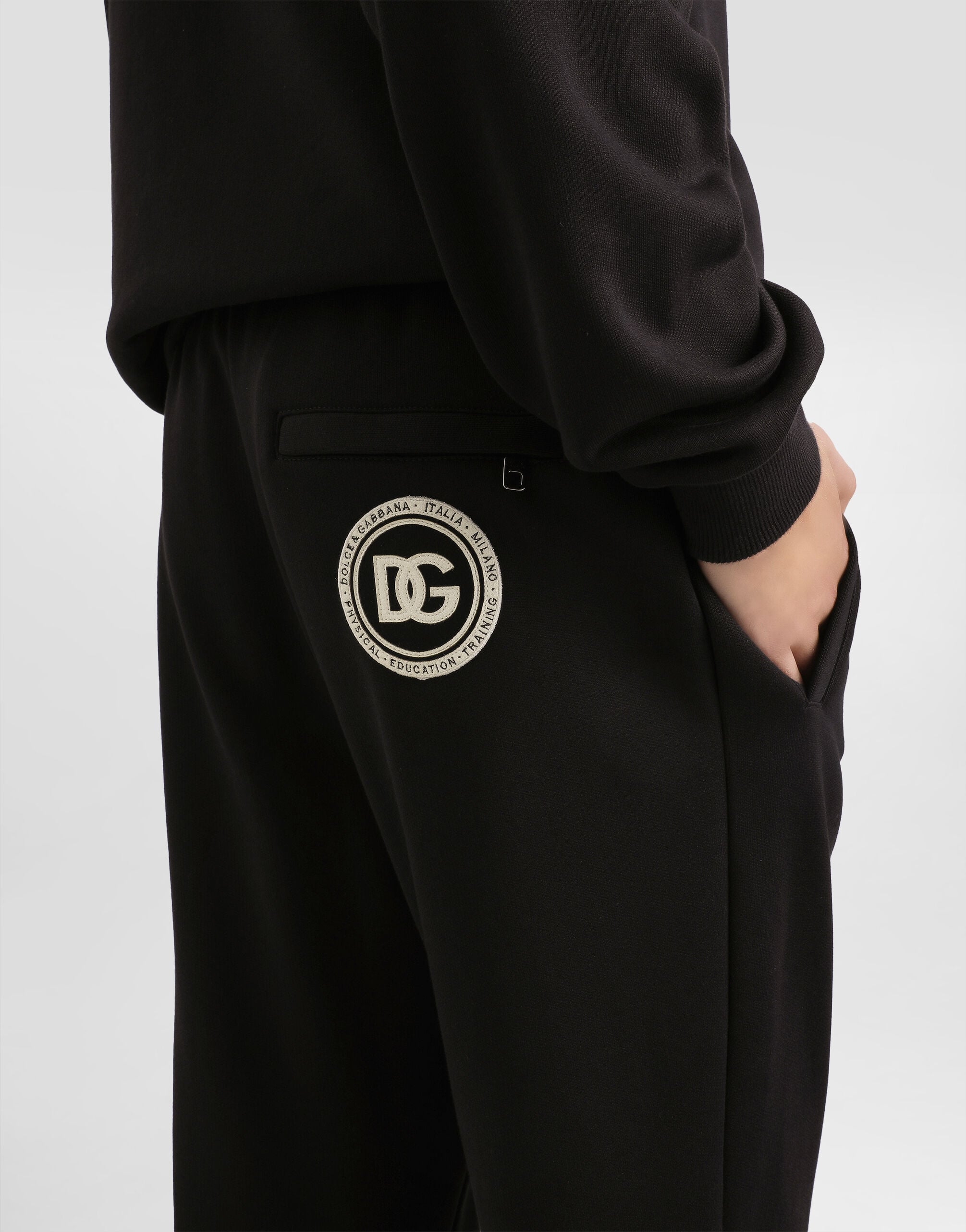 Jersey trousers with patch in Black for Men | Dolce&Gabbana® US