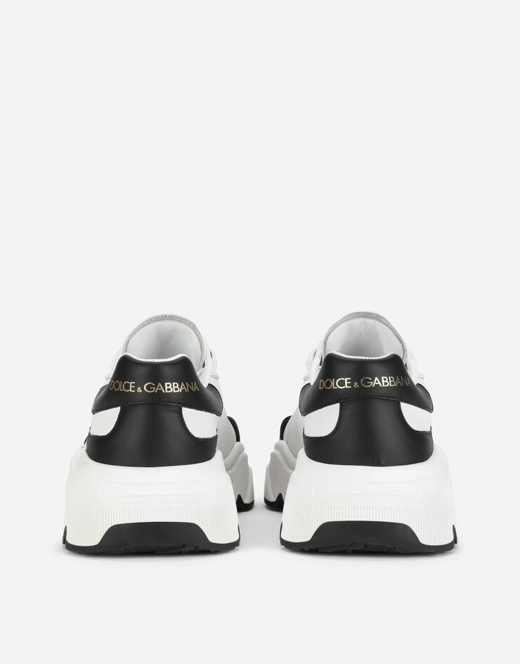 Dolce & Gabbana حذاء رياضي داي ماستر من جلد نابا أبيض/أسود CK1791AX589