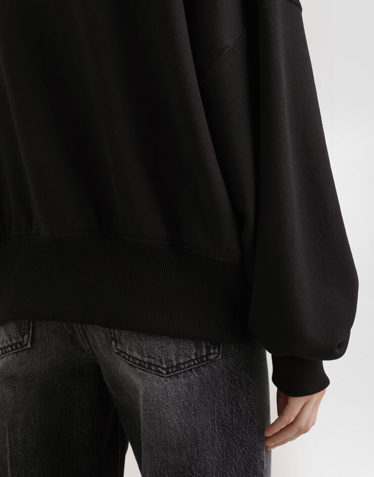 Dolce & Gabbana Fleece hoodie with patch Black F9U32ZGDDMA