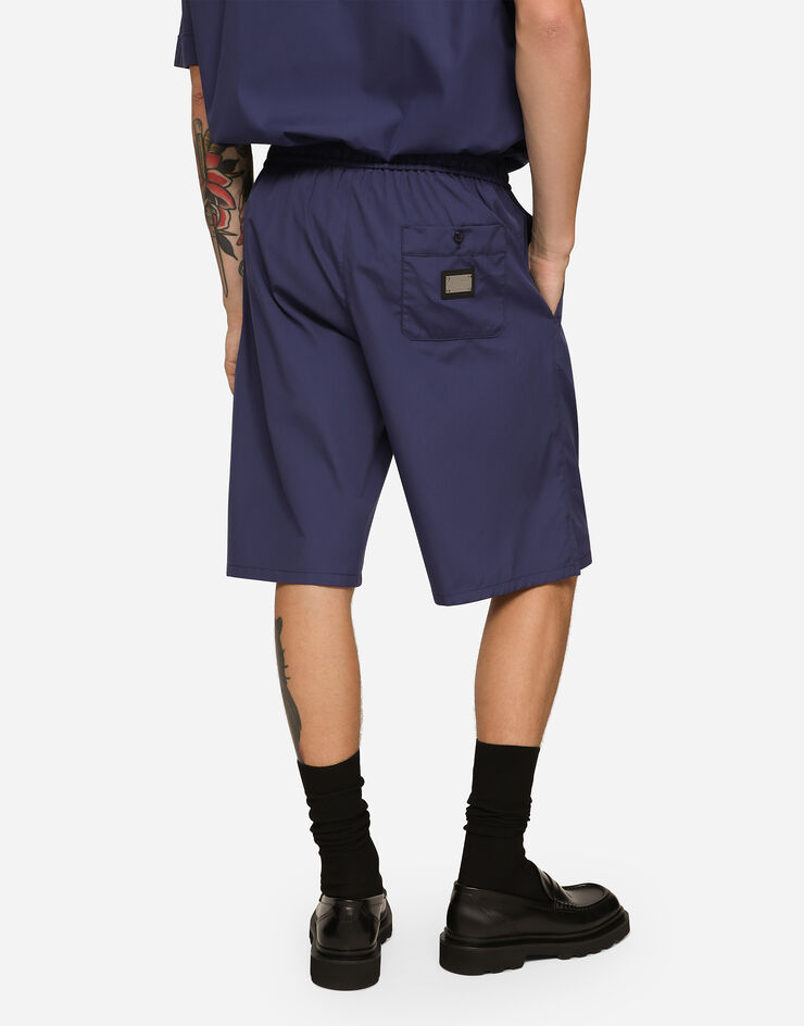 Dolce & Gabbana Jogging-Bermudashorts aus Baumwolle mit Logoplakette Blau GV37ATGF855