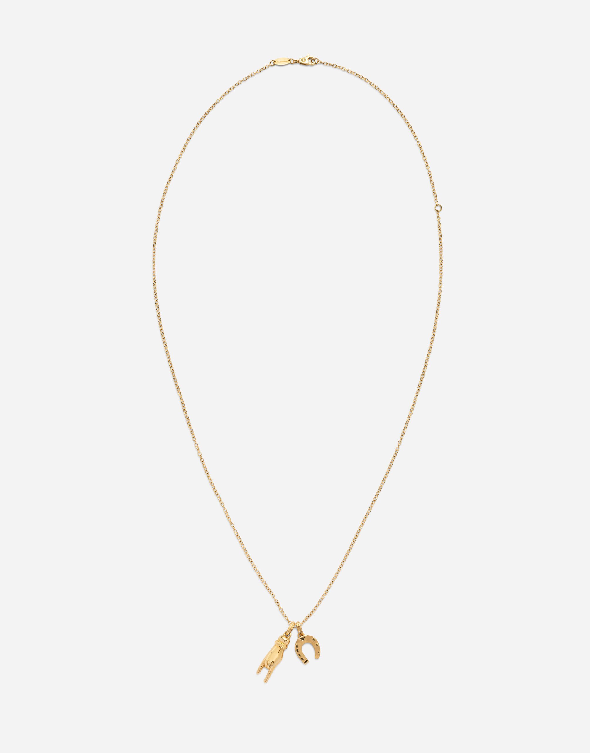 Dolce & Gabbana Good luck hand with horn and horseshoe pendants on yellow gold chain Yellow WAQP2GWSAP1