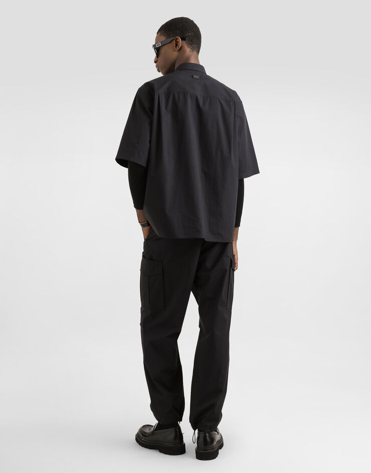 Dolce & Gabbana Cargohose aus Baumwolle Schwarz GP0L1TFUEFJ