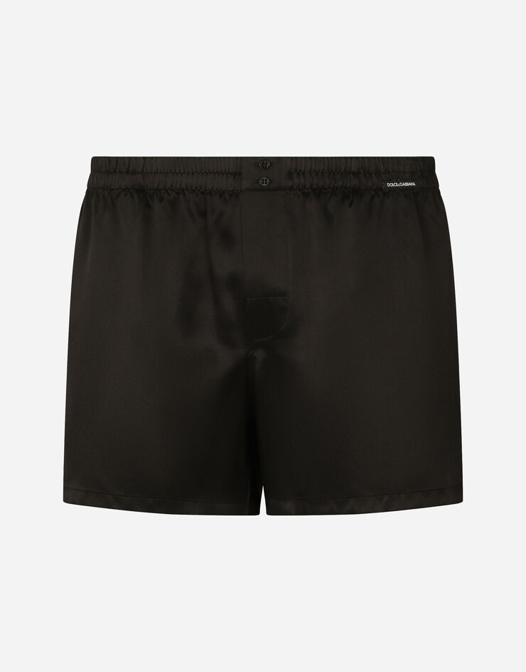 Dolce & Gabbana Shorts aus Seide mit Logoetikett Schwarz M3A05TFU1AU