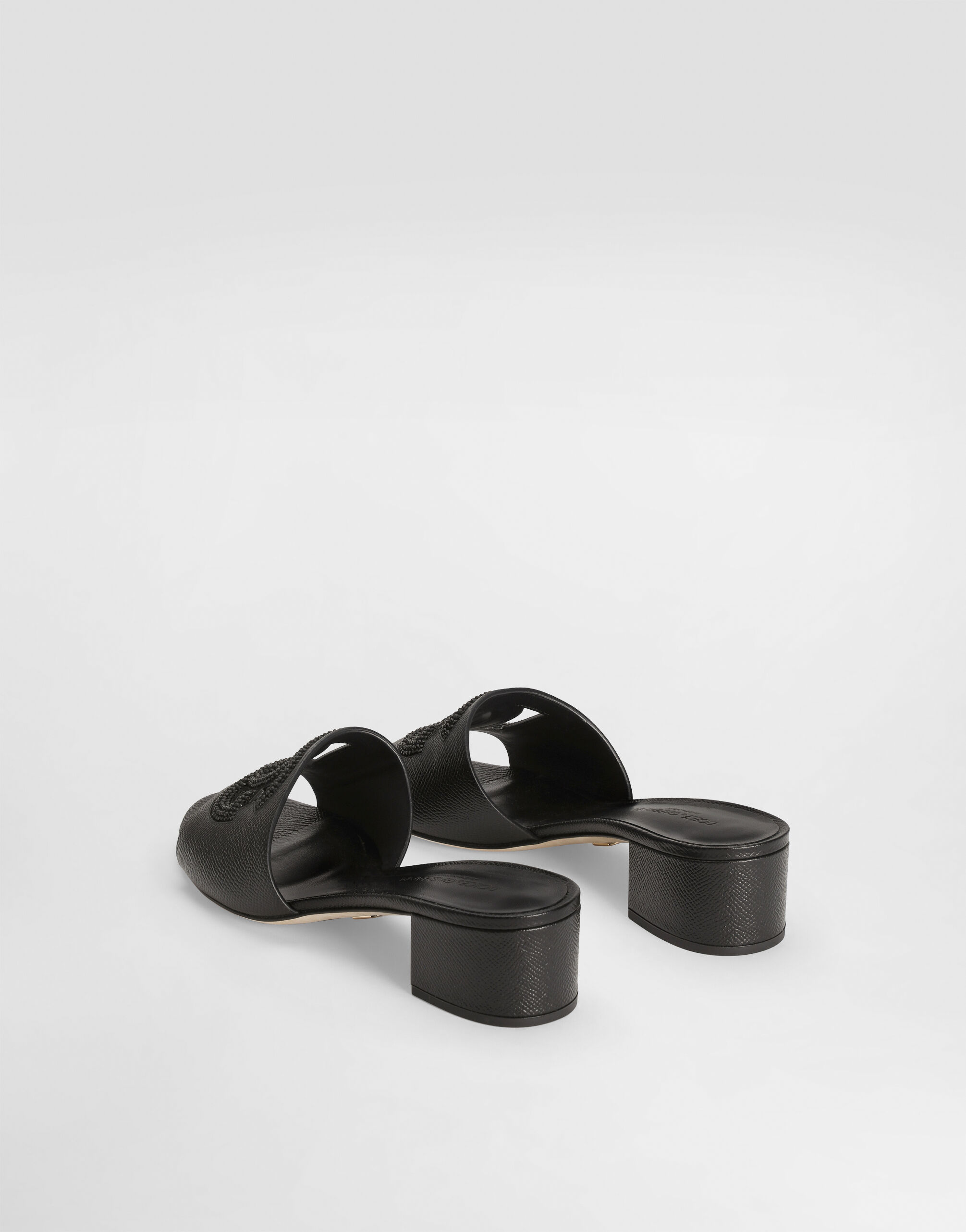 Mule in dauphine calfskin, suede and rhinestones in Black for