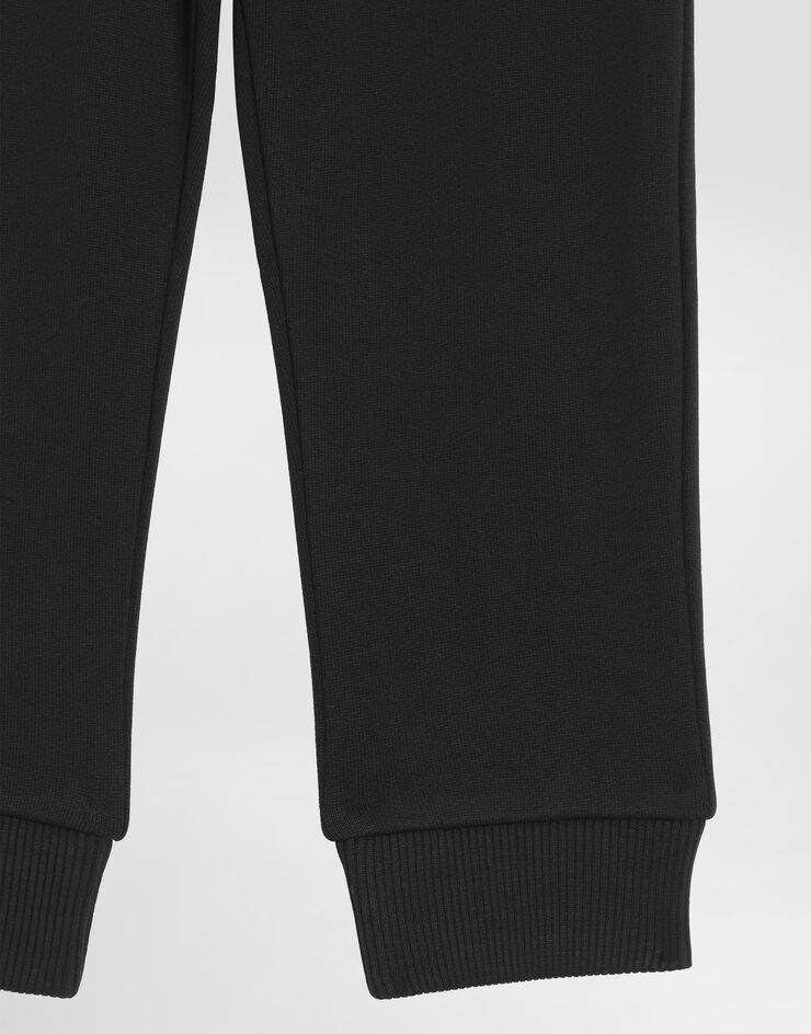 Dolce & Gabbana Jersey jogging pants with logo plate Black L4JPT0G7OLJ