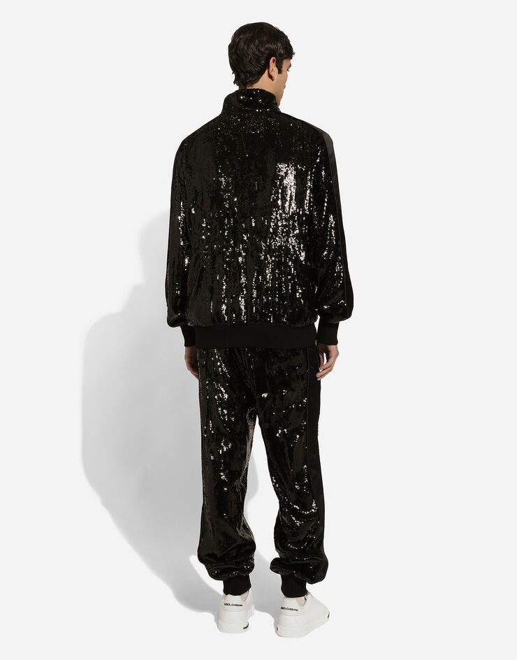 Dolce & Gabbana Sequined zip-up sweatshirt with rhinestone-detailed DG patch Black G9ZG1ZHLMTJ