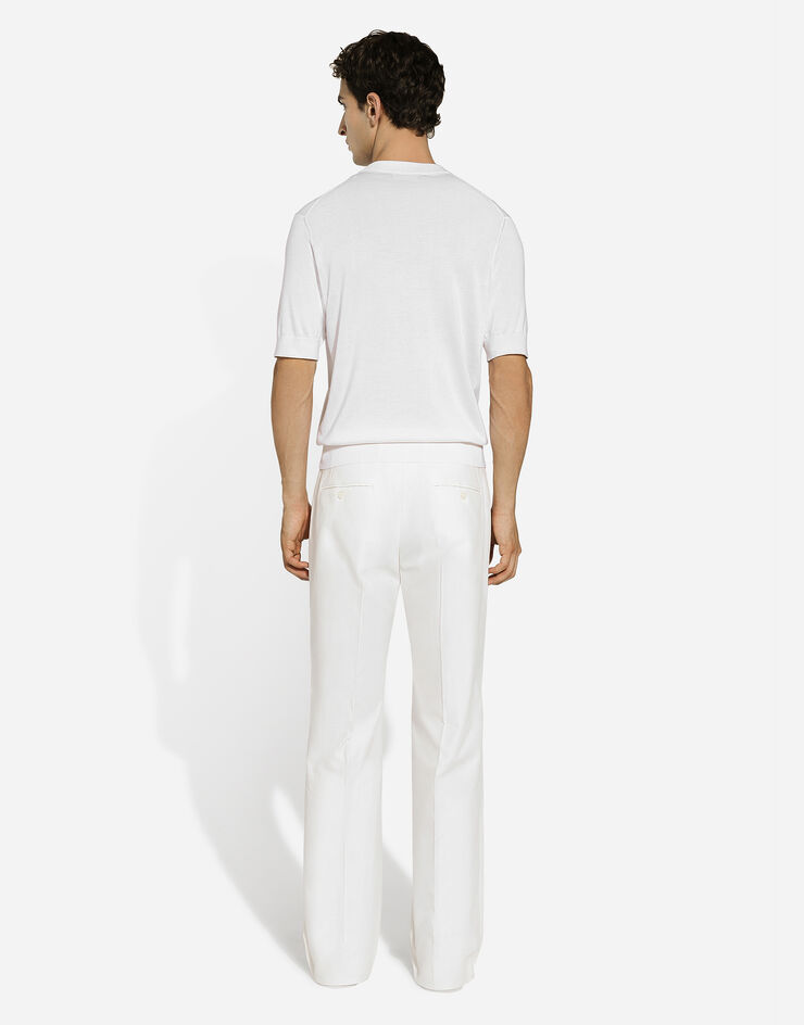 Dolce & Gabbana Serafino-Shirt aus Seide mit Dolce&Gabbana-Logostickerei Weiss GXX04ZJBSJS
