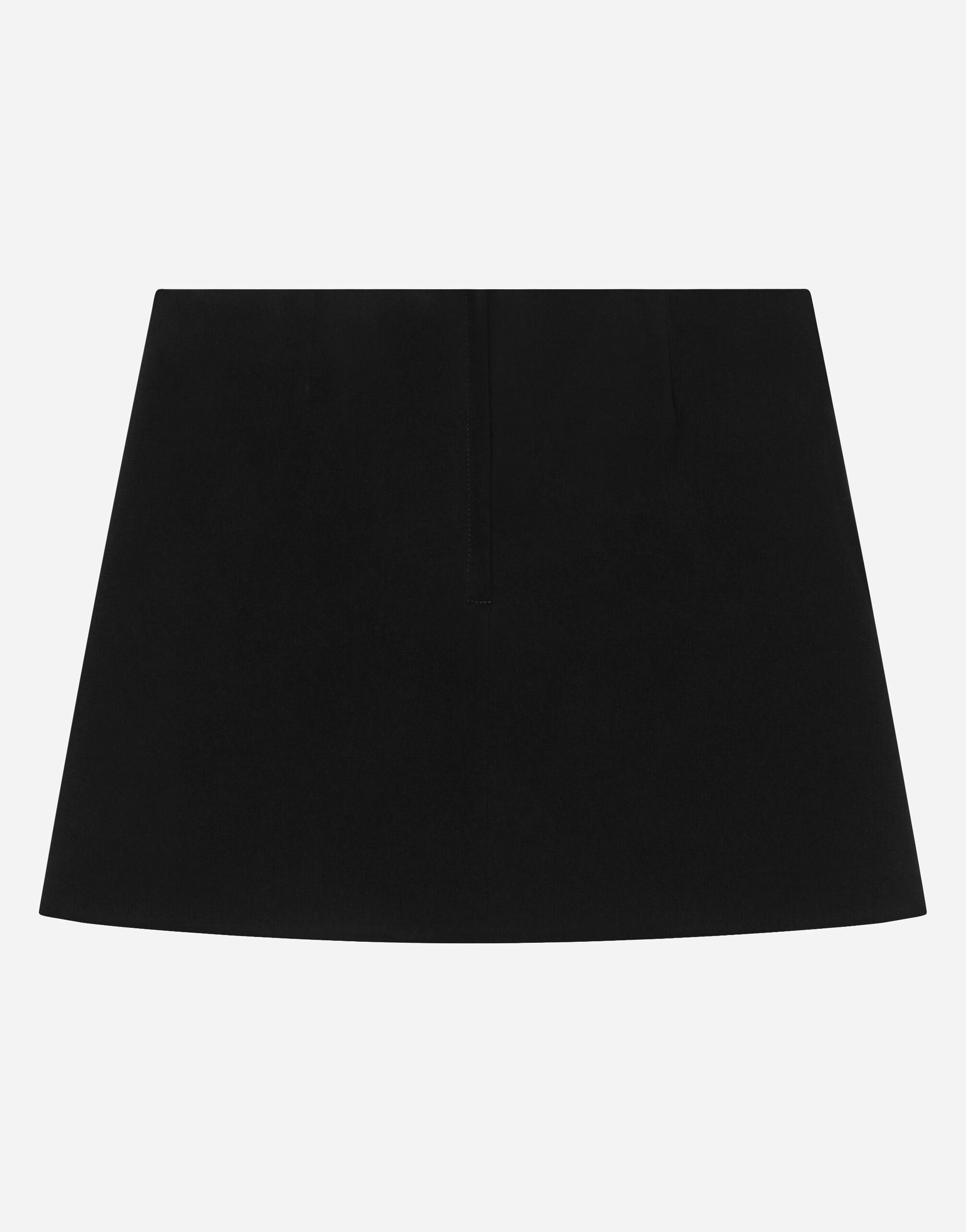 Miniskirt with DG logo in Black for Girls | Dolce&Gabbana® US
