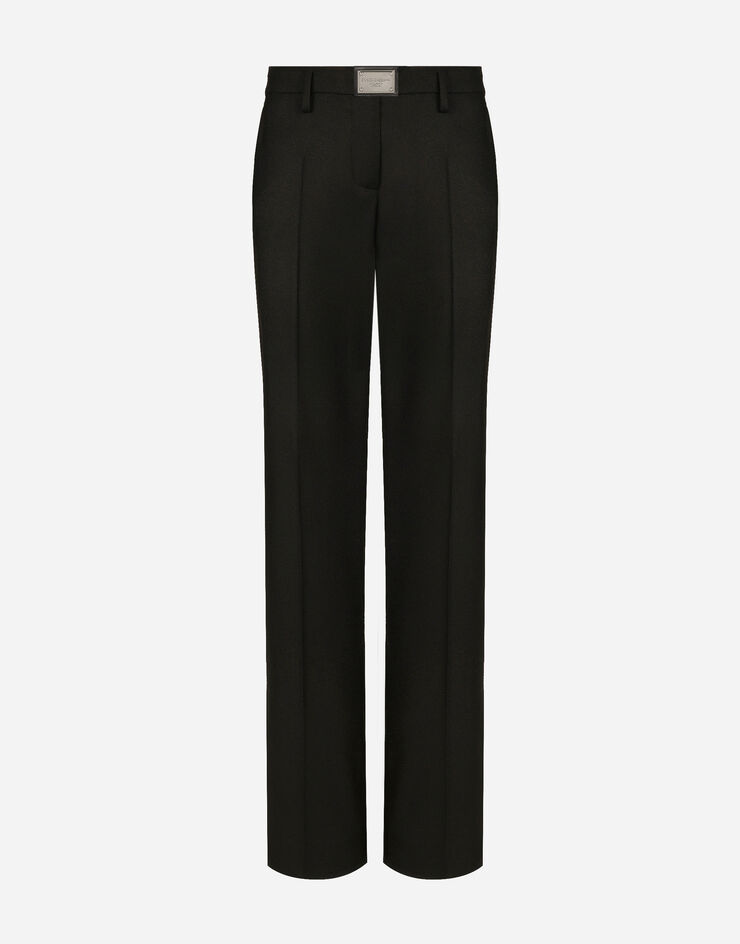 Dolce&Gabbana Pantalon flare en flanelle avec plaquette à logo Noir FTCZITGDBWV