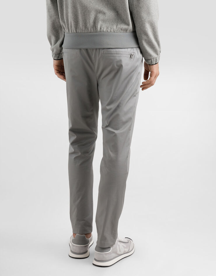 Dolce & Gabbana Pantalón de chándal de algodón con placa Gris GYACETFUFNV