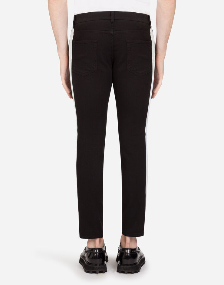 Dolce & Gabbana Stretch skinny jeans with strips and patch BLUE GYC4LZG8BW8