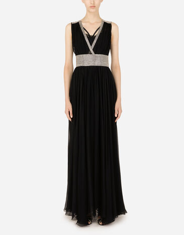 Dolce & Gabbana Long chiffon dress with fusible rhinestone detailing Black F6ZO1ZGD32T