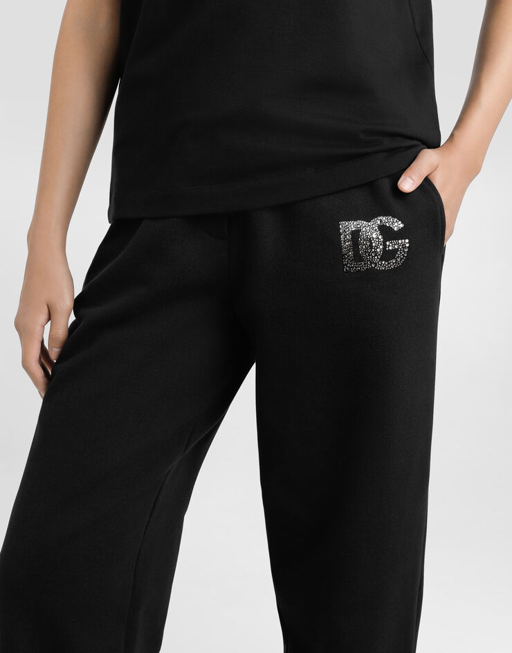 Dolce & Gabbana Pantaloni jogging in jersey con ricamo logo DG  in strass Nero FTC91ZGDCXW