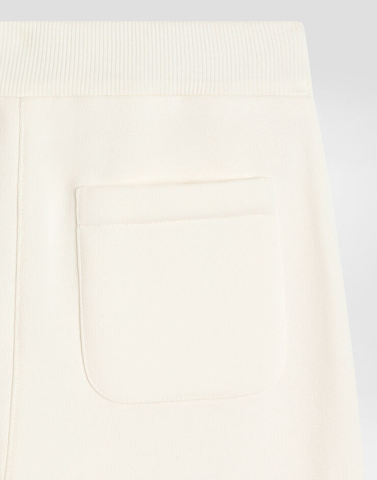 Dolce & Gabbana Fleece trousers with DG embroidery and rhinestones White L5JPE3G7PVI