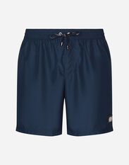 Dolce & Gabbana Long-leg swim trunks with branded tag Blue M4E48TONO06
