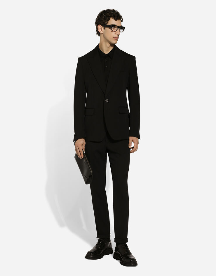 Dolce & Gabbana Chaqueta de botonadura sencilla de gabardina técnica Negro G2TV4TFURNV