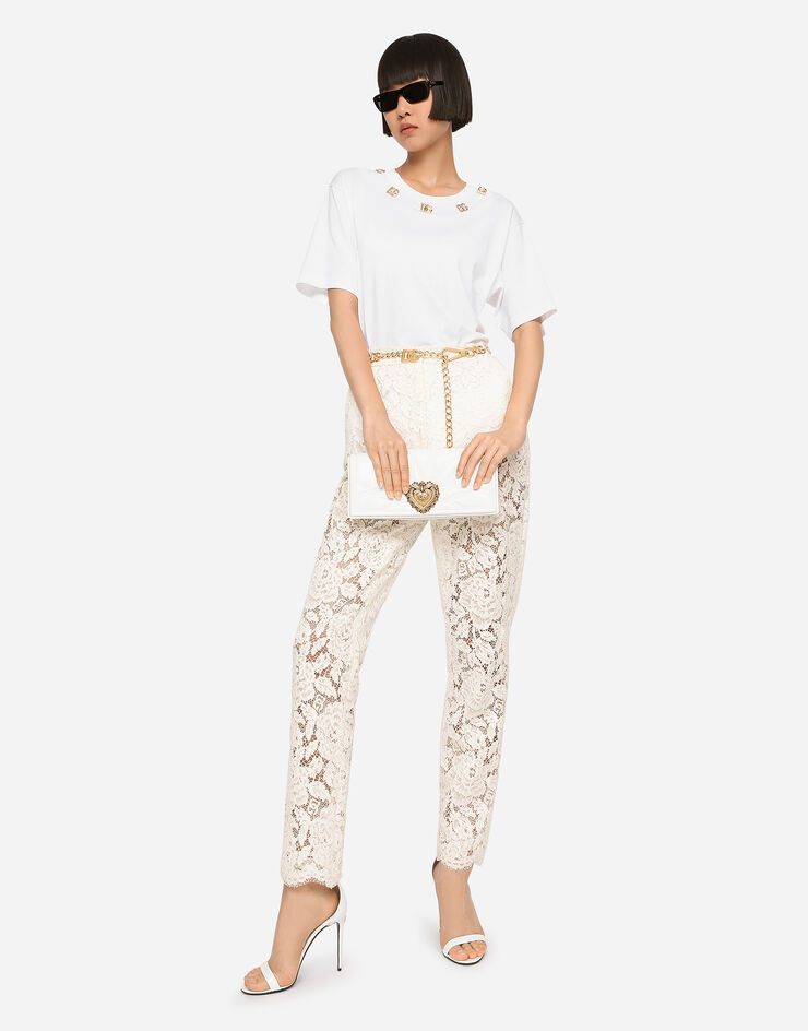 Dolce & Gabbana Pantalon en dentelle stretch à logo Blanc FTAM2TFLRE1