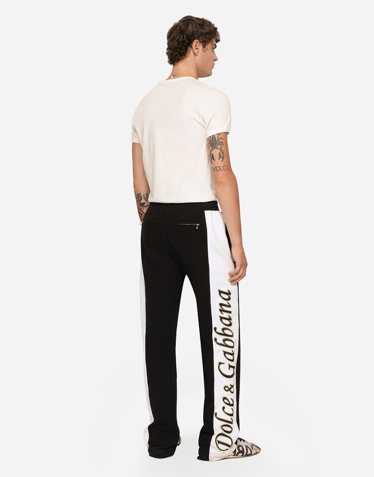 Dolce & Gabbana Pantalone jogging jersey con bande ricamate Nero GVR7HZG7I3I