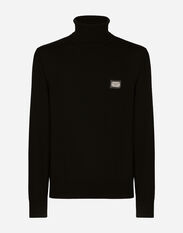 Dolce & Gabbana Wool turtle-neck sweater with branded tag Black GXN41TJEMI9