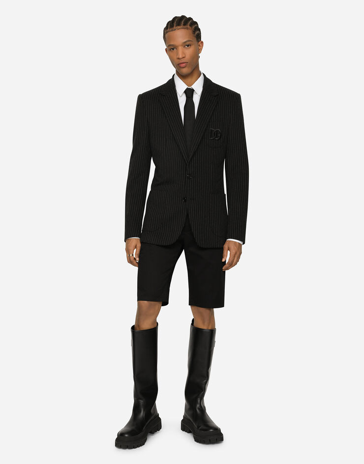 Dolce & Gabbana Bermudas de algodón elástico con parche DG Negro GWRREZGG869