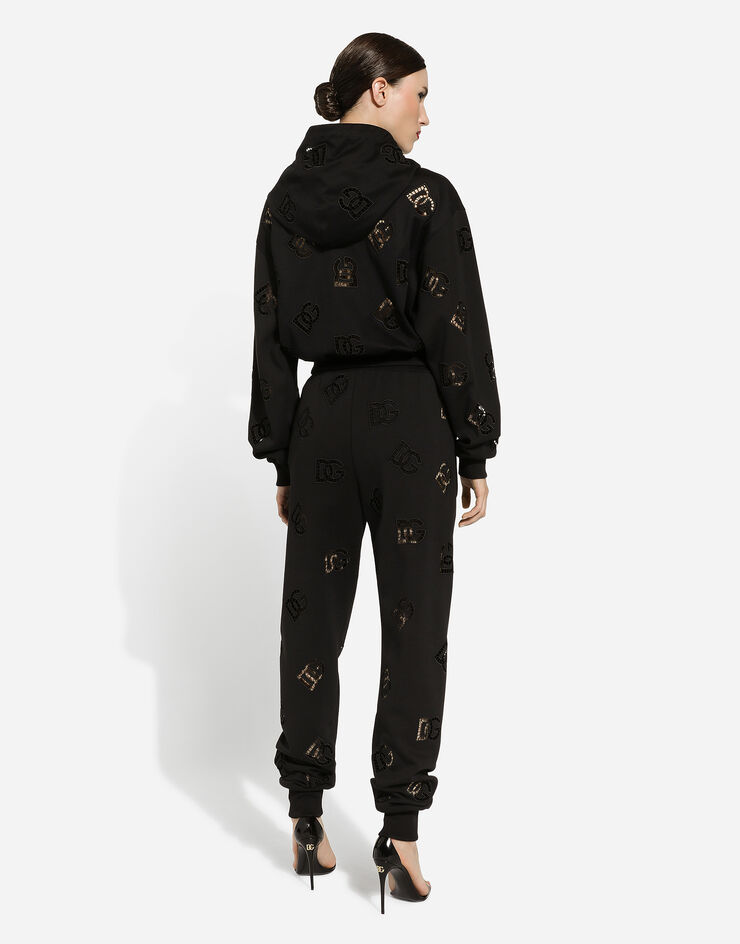 Dolce & Gabbana Jersey jogging pants with cut-out and DG logo Black FTCP7ZGDB9U