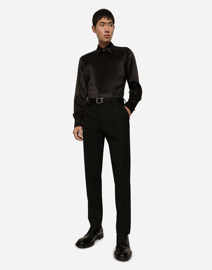 Dolce & Gabbana Pantalon en laine stretch avec taille à logo Noir GVRJETFUBE7