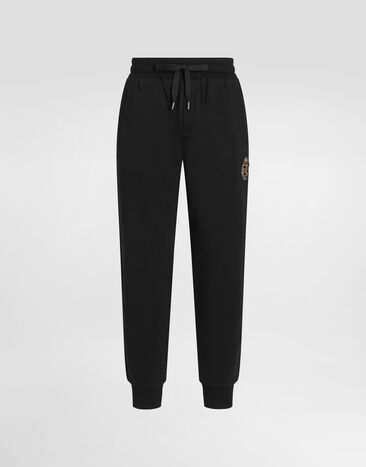 Dolce & Gabbana Jersey trousers with heraldic patch Black GP07TZG7PZT