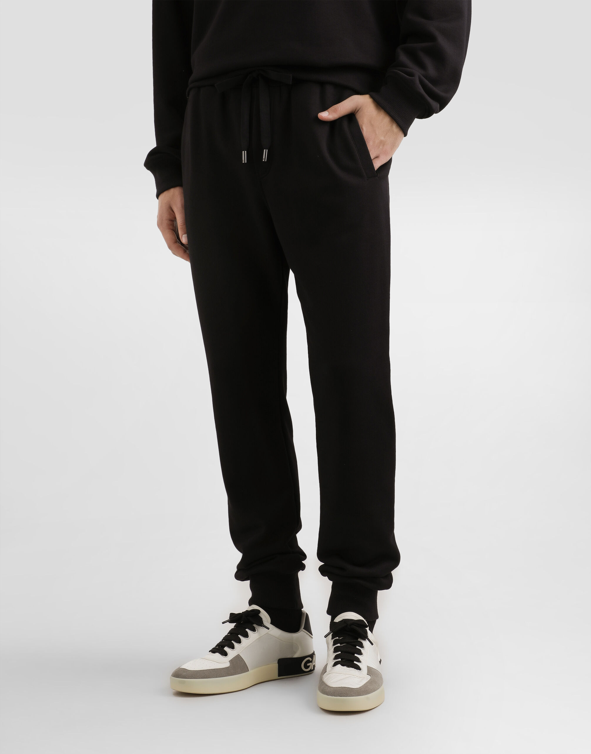 Jersey trousers with patch in Black for Men | Dolce&Gabbana® US