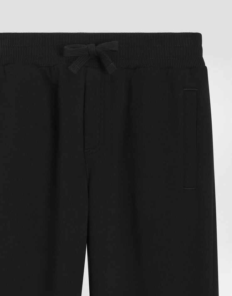 Dolce & Gabbana Fleece trousers with DG print Black L4JPT0G7P2B
