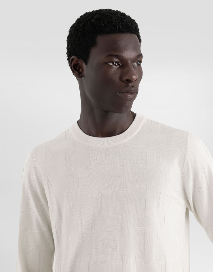 Dolce & Gabbana Pull ras de cou en soie avec logo DG brodé all-over Blanc GXX02TJBSK5