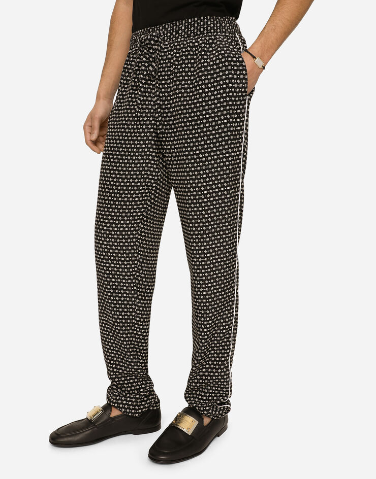 Dolce & Gabbana Crepe de chine jogging pants with DG logo print Black GVCRATIS1RF