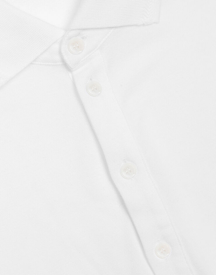 Dolce & Gabbana قميص بولو من قطن بيكيه بتطريز أبيض G8LZ1ZG7WUR