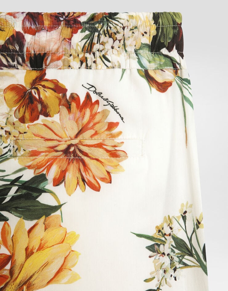 Dolce & Gabbana Pantalón en popelina de algodón con estampado de flores Imprima L53P50HS5TV