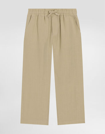 Dolce & Gabbana Linen trousers with DG logo embroidery Beige L44P86G7O9A