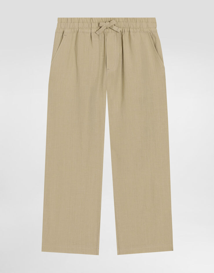 Dolce & Gabbana Pantaloni in lino con logo DG ricamato Beige L44P86G7O9A