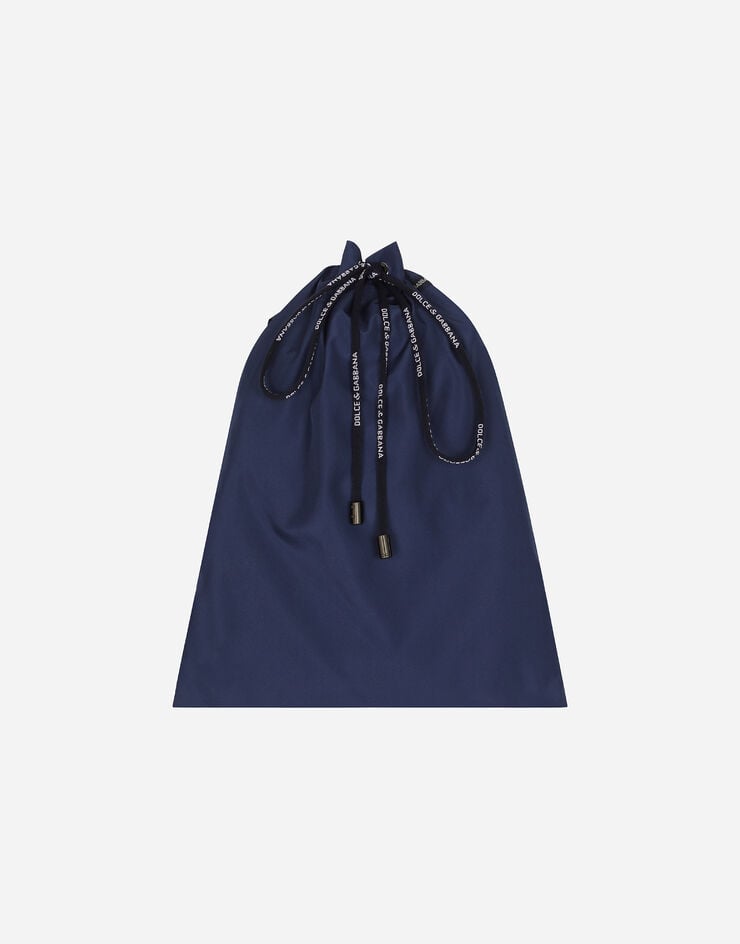 Dolce & Gabbana Mid-length swim trunks with logo tag Blue M4E45TONO06