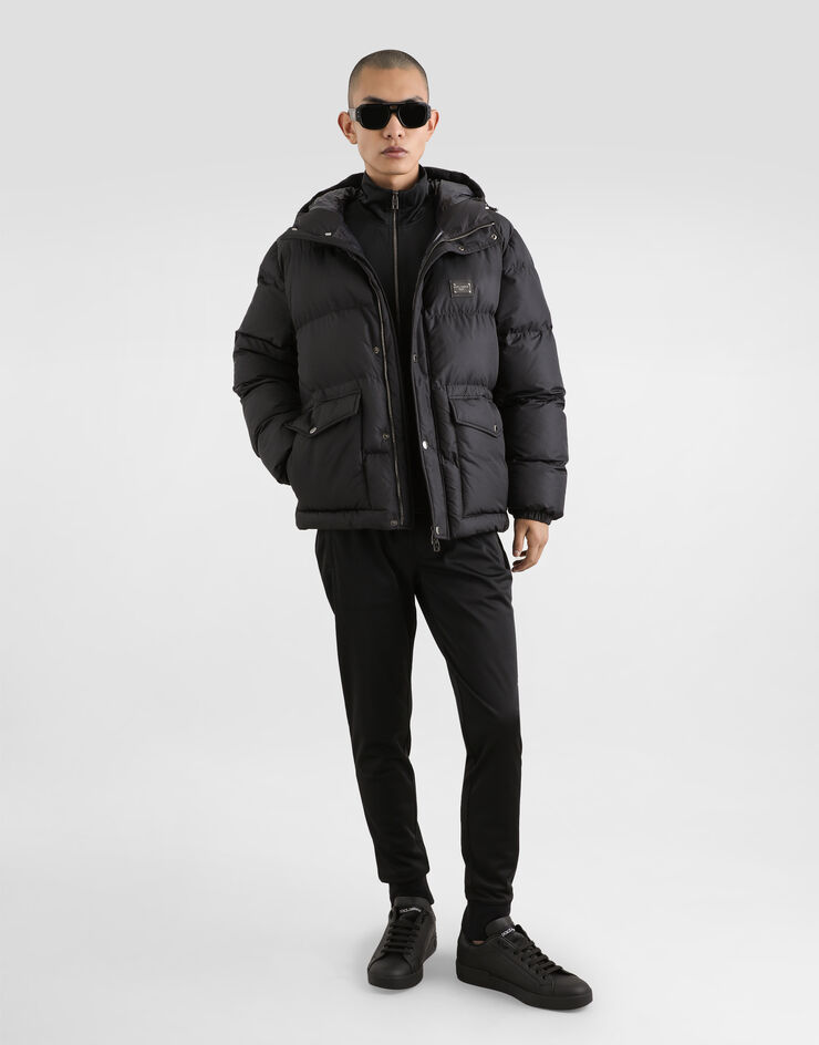 Dolce&Gabbana Piumino nylon con cappuccio e placca logata Nero G9AOKTGG781