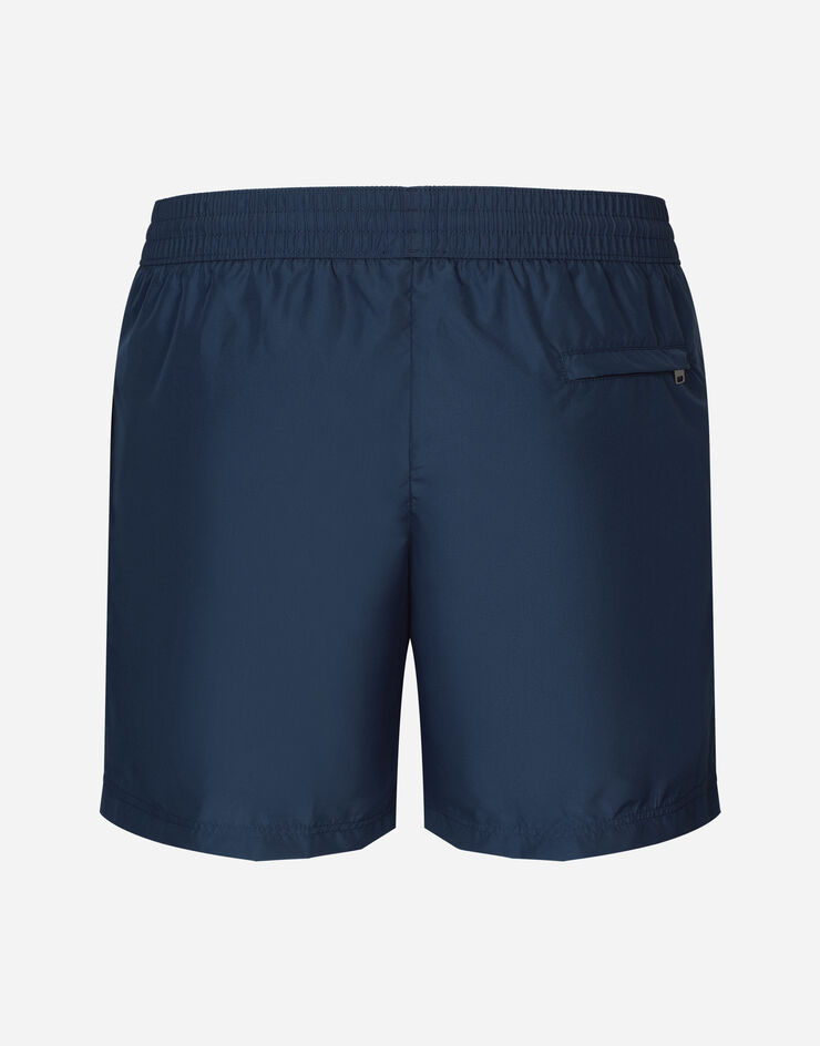 Dolce & Gabbana Long-leg swim trunks with branded tag Blue M4E50TFUSFW