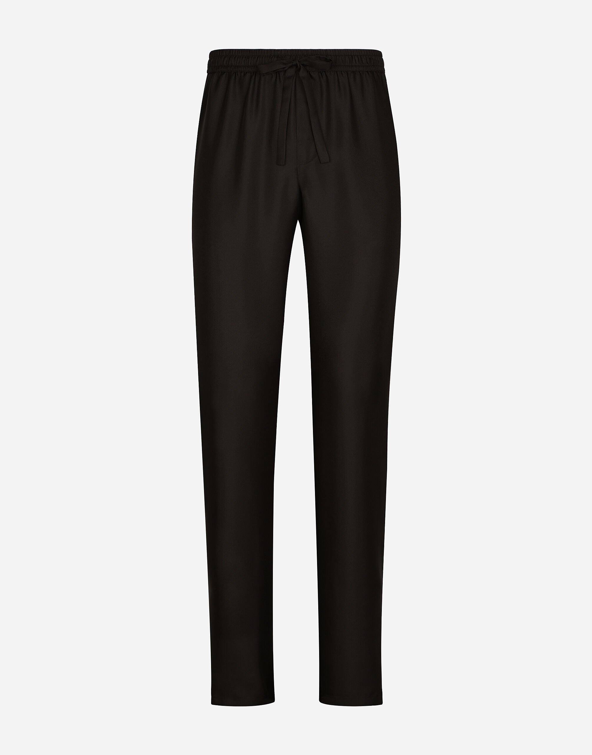 Dolce & Gabbana Pantalon de jogging en soie à écusson broderie DG Noir G2RQ2TGF815