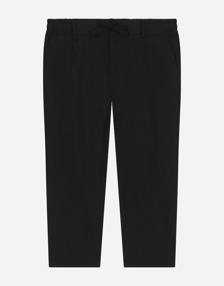 Dolce & Gabbana Pantalon en popeline stretch avec plaquette à logo Noir L43P32FUFIP