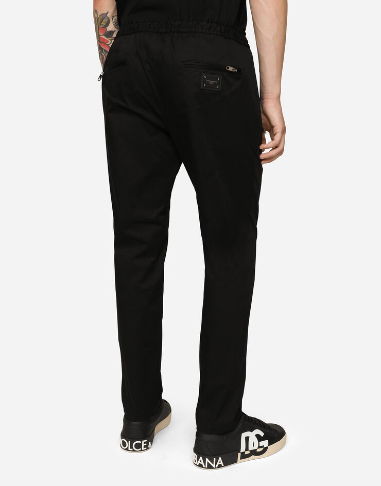 Dolce & Gabbana Stretch cotton jogging pants with plate Black GYACETFUFIS