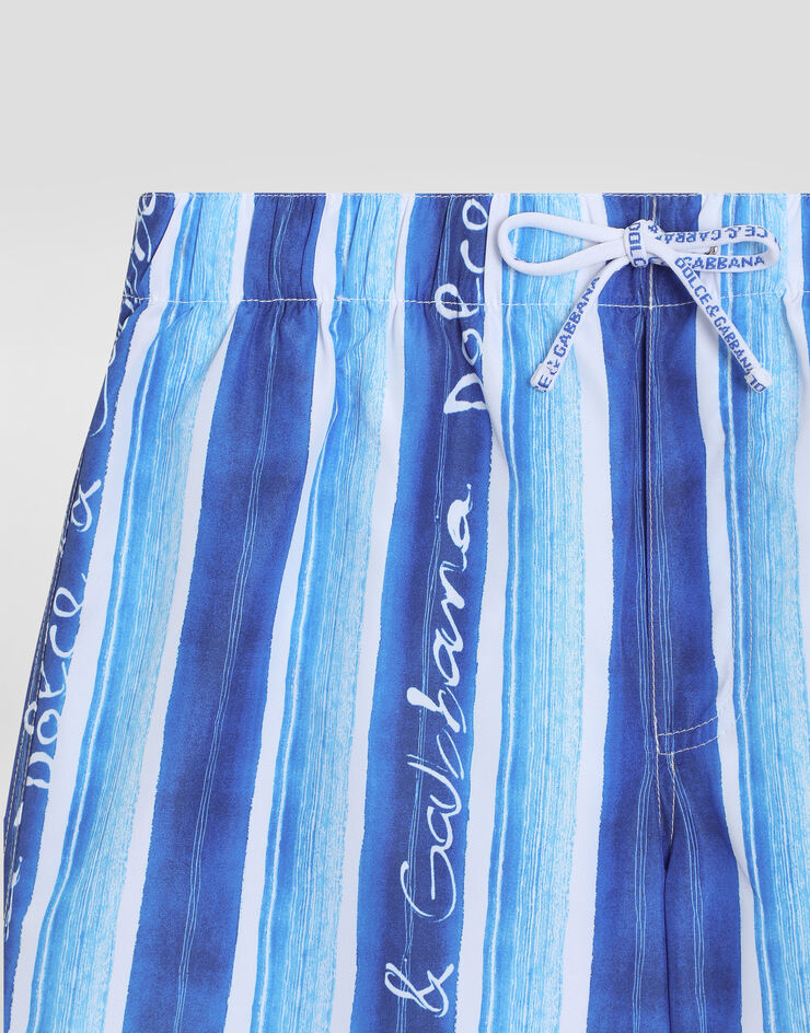 Dolce & Gabbana Badeshorts aus Gewebe in Leinwandbindung Streifenprint Blau L4J818ON03Q